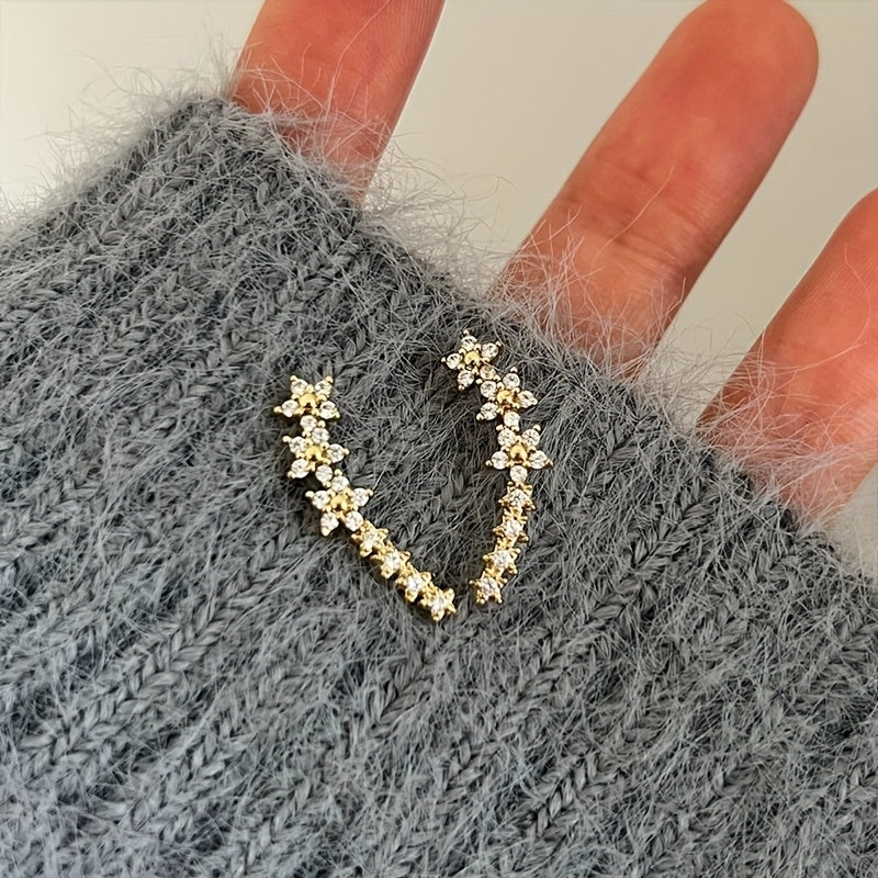 Laikinos gėlių auskarų kilpos